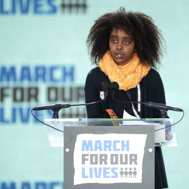 WASHINGTON, DC - MARCH 24: Eleven-year-old Naomi Wadler addresses the March for Our Lives rally on March 24, 2018 in Washington, DC. Hundreds of thousands of demonstrators, including students, teachers and parents gathered in Washington for the anti-gun violence rally organized by survivors of the Marjory Stoneman Douglas High School shooting on February 14 that left 17 dead. More than 800 related events are taking place around the world to call for legislative action to address school safety and gun violence. (Photo by Chip Somodevilla/Getty Images)